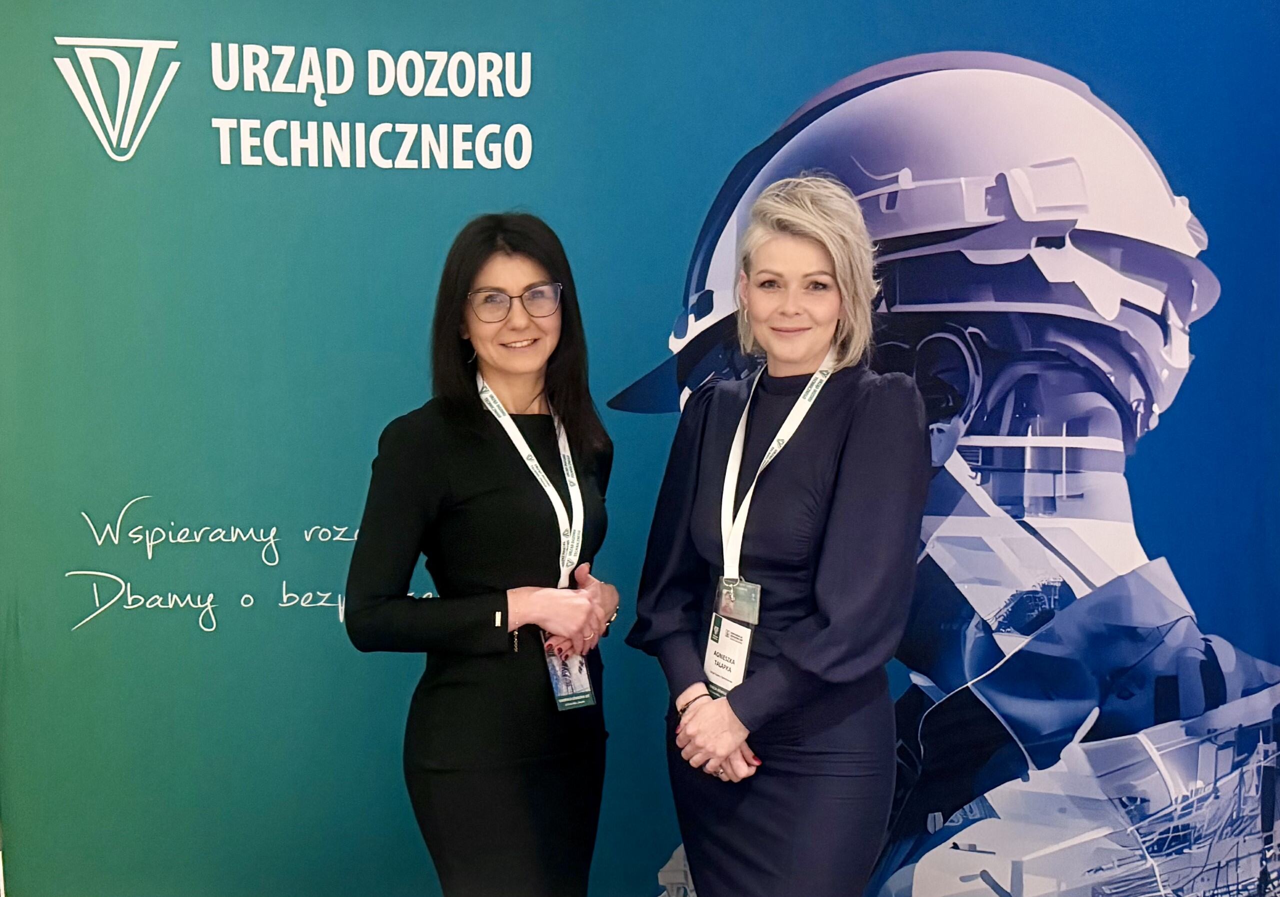 osoby obsługujące konferencję